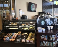 The inside of the cafe, showcasing fresh ready-to-go food items. The inside of the cafe, showcasing fresh food.
